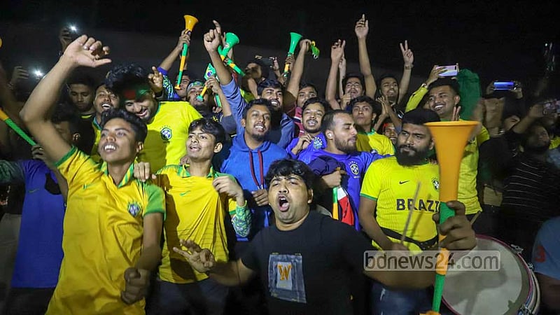 Bangladeshi fans at Dhaka University’s TSC celebrate Brazil’s win over South Korea in their last 16 clash of the Qatar World Cup.