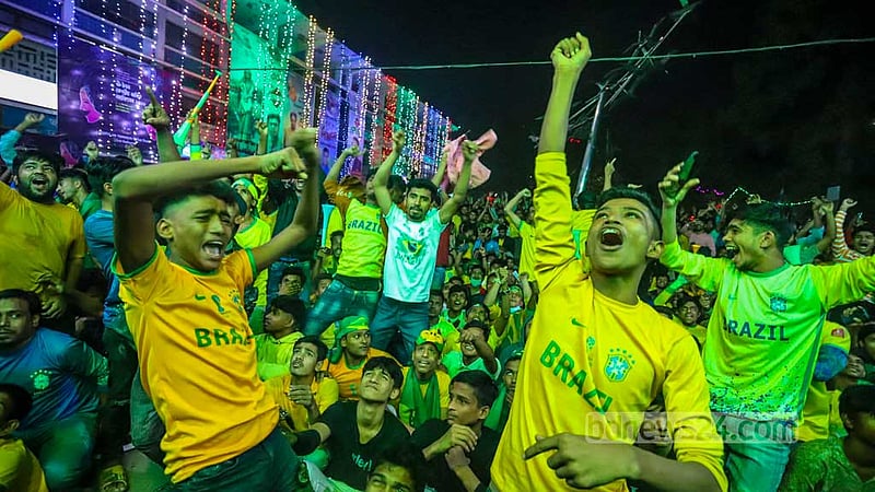 Thousands of Bangladeshi fans at Dhaka University celebrate a goal scored by Brazil against South Korea in their last 16 clash of the Qatar World Cup.