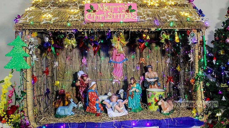Holy Rosary Church in the capital's Tejgaon is decorated with religious statues depicting the scene of Jesus Christ's birth on Christmas Day on Dec 25, 2022. Photo: Asif Mahmud Ove