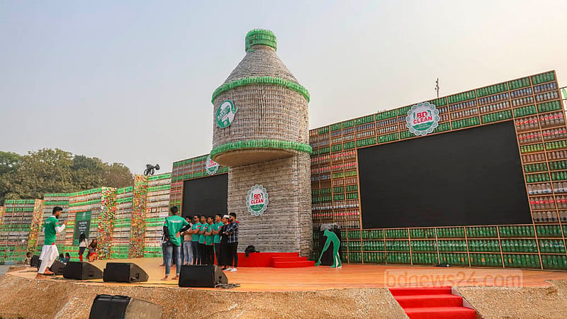 The main stage of an exhibition takes the form of a plastic bottle to build awareness and prevent plastic pollution. Photo: Asif Mahmud Ove
