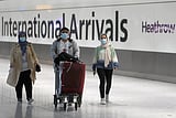 WHO urges travellers to wear masks