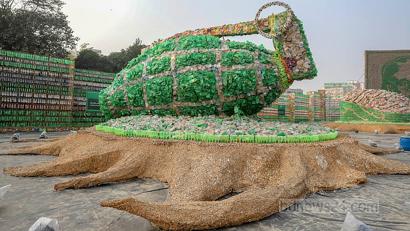 Due to a lack of awareness, the world is turning into a plastic wasteland. This sculpture of a grenade made of recycled materials represents the ticking time bomb of plastic pollution. Photo: Asif Mahmud Ove