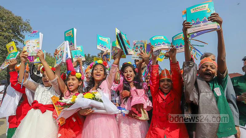 Promotion to a new class with new textbooks makes students happy. Photo: Asif Mahmud Ove