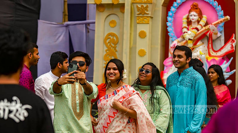 Visitors celebrate the Saraswati Puja in Jagannath Hall ground at Dhaka University in a festive atmosphere on Thursday, Jan 26, 2023. Photo: Mahmud Zaman Ovi
