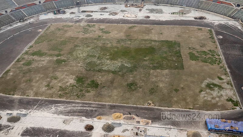 The work of laying down a football pitch is underway at the Bangabandhu National Stadium in Dhaka. Photo: Asif Mahmud Ove