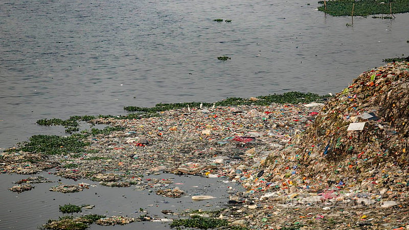 The Dhaleshwari River at Savar’s Hemayetpur is being polluted by waste dumped on its banks. All trash dumped on the banks of the river ends up in the river water. Photo: Mahmud Zaman Ovi