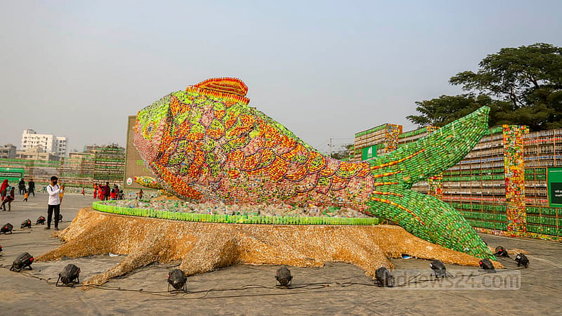 A sculpture representing the harmful impacts of plastic pollution on the reproduction of fish is on display at an exhibition on the T&amp;T ground in Dhaka's Mohakhali. Photo: Asif Mahmud Ove