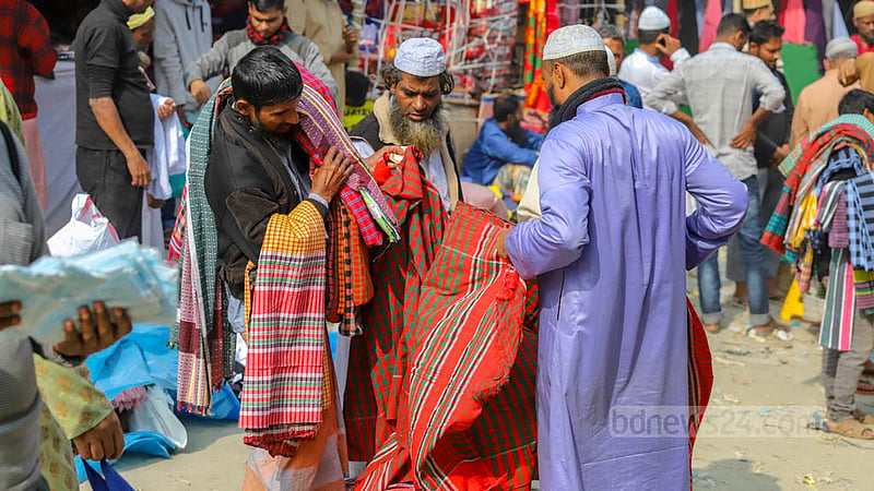 Vendors are selling various products, from prayer mats to towels, at the Biswa Ijtema ground in Tongi. Photo: Asif Mahmud Ove