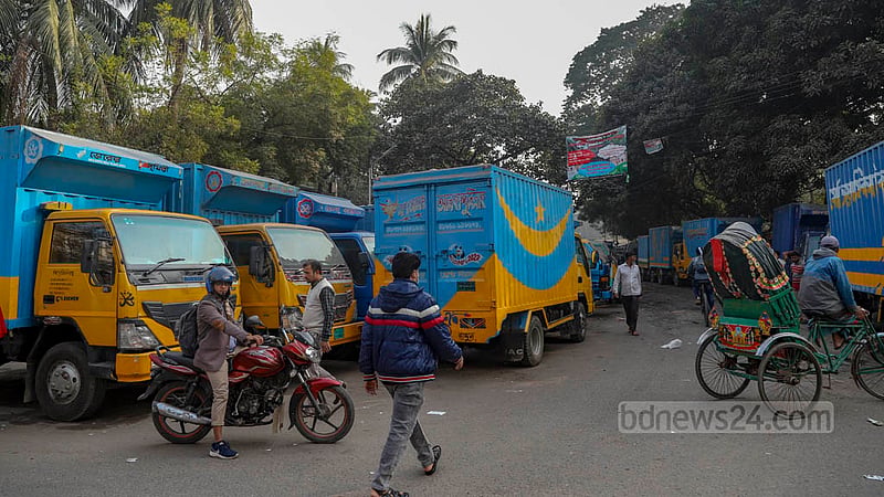Trucks, pickups and covered vans are parked on both sides of the road from Saat Rasta to Karwan Bazar level crossing via Tejgaon truck stand. As a result, the road has become narrow, hampering traffic. Photo: Mahmud Zaman Ovi