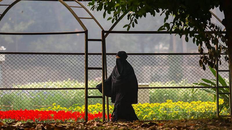 Visitors take an afternoon walk at Ramna Park in Dhaka. Photo: Mahmud Zaman Ovi