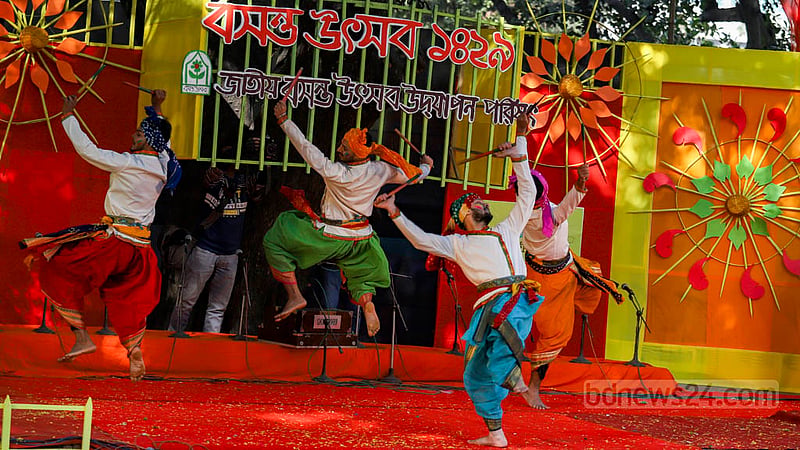 Dancers perform at a programme to celebrate Pahela Falgun, the first day of spring in the Bangla calendar, at Bakultala in Dhaka University’s Faculty of Fine Arts on Tuesday, Feb 14, 2023. Photo: Mahmud Zaman Ovi