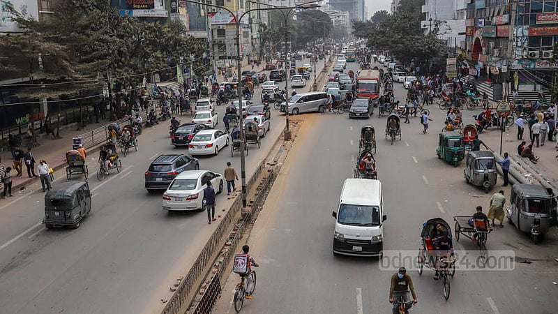 Not a single tree is left at Dhaka’s Saat Masjid Road which was surrounded by greenery as Dhaka South City Corporation cut down the trees for constructing a new road divider removing the old one. Photo: Asif Mahmud Ove