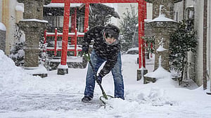 Heavy snow in Japan disrupts flights, trains