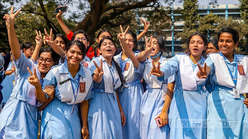 Viqarunnisa Noon School and College students flash the V sign as they celebrate their success in the HSC exams after the publication of the results on Wednesday, Feb 8, 2023. Photo: Mahmud Zaman Ovi