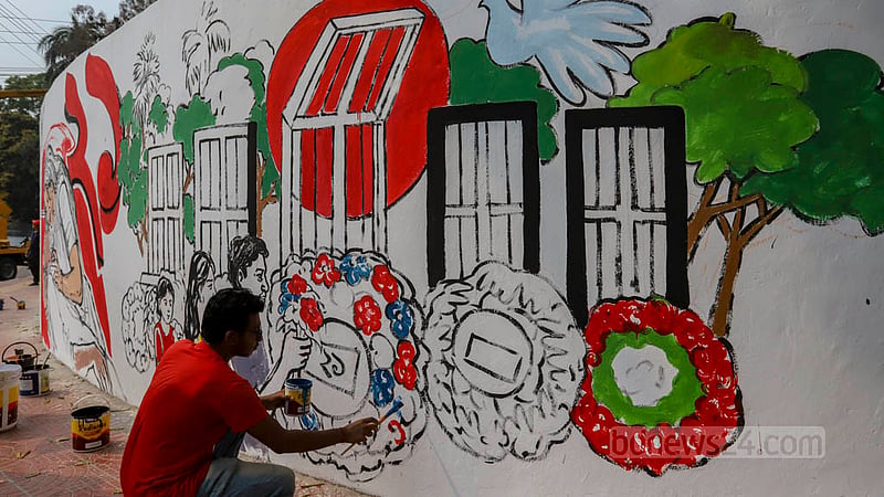 An artist depicts the 1952 Language Movement on a wall near the Central Shaheed Minar in Dhaka on Sunday, Feb 19, 2023.