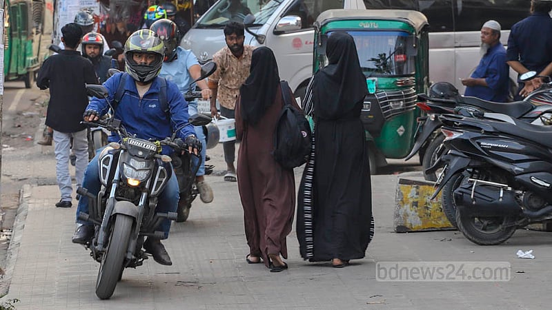 Many motorcyclists drove onto the footpaths of Shaheed Tajuddin Ahmed Sarani disrupting pedestrian movement on Thursday, Feb 2, 2023. Photo: Asif Mahmud Ove