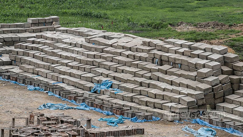 Blocks are stacked up on the banks of the Turag River in Mirpur’s Diabari for the construction of embankments and walkways. Photo: Asif Mahmud Ove