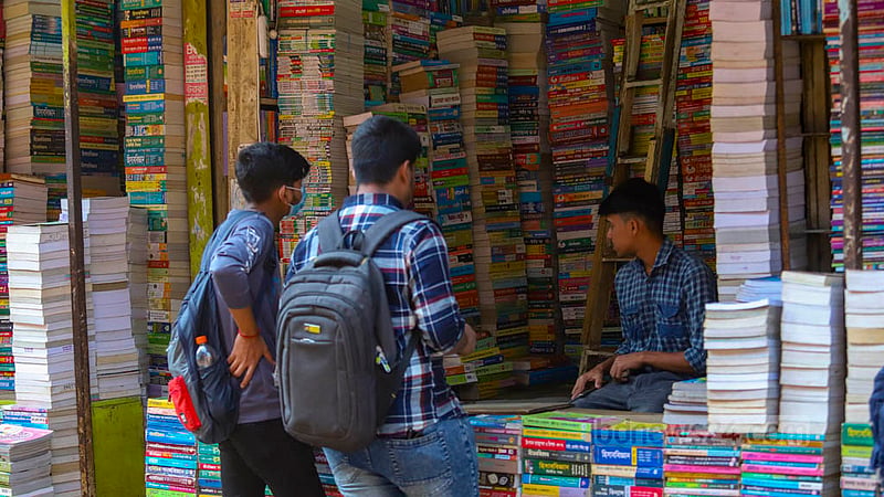 Students are looking for textbooks in the old books section of the Nilkhet book market.  Photo: Mahmud Zaman Ovi
