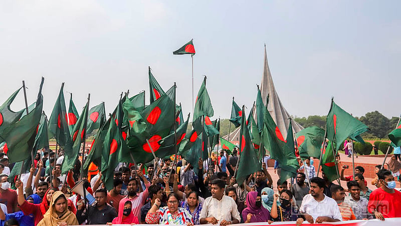 A group of garment workers pay their respects to the martyrs of the Liberation War at the National Martyrs’ Memorial on Sunday, Mar 26, 2023. Photo: Asif Mahmud Ove