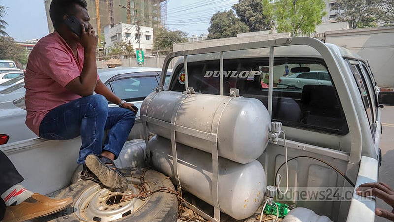 Bidyut Bhaban's CNG car cylinder expired a while ago, but the label was painted over to continue using it. But, using cylinders that expired can lead to major accidents. Photo: Asif Mahmud Ove