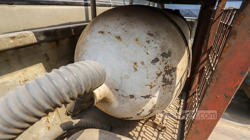 The CNG-powered government vehicle parked on the road in front of the secretariat in Dhaka had a white cylinder rusty in several spots and did not have an expiry date labelled on it. Photo: Asif Mahmud Ove