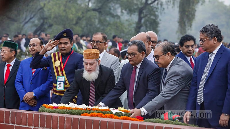 Chief Justice Hasan Foez Siddique pays tribute to the martyrs of the 1971 Liberation War at the National Martyrs’ Memorial in Savar on Sunday, Mar 26, 2023.