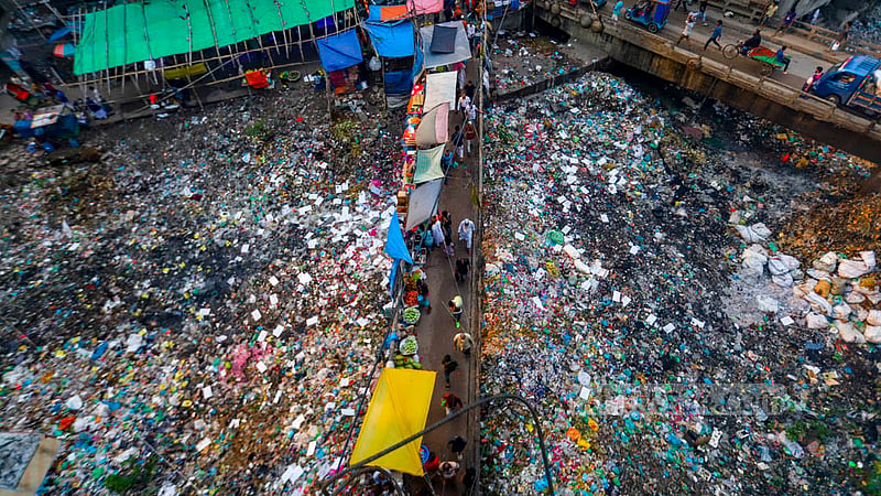 Mar 30: The seven-kilometre long Shuvadda canal, once a source of water in Dhaka’s Keraniganj, is filled with wastes, especially plastics, to the brim. 