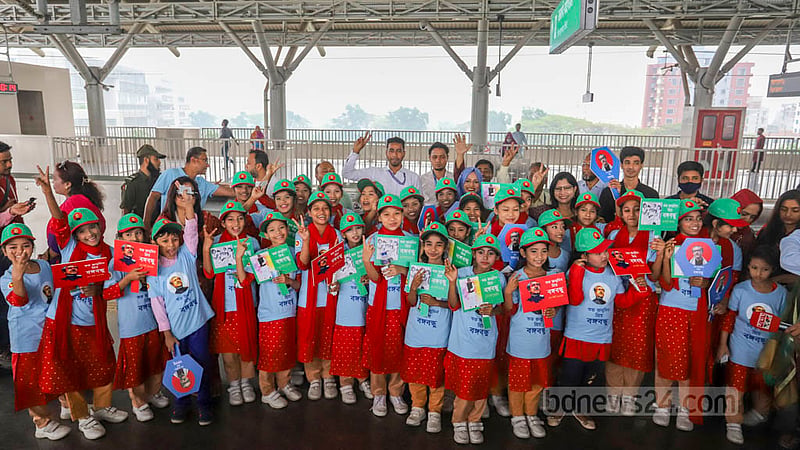 Children look excited as they start their joy ride on the metro. Photo: Asif Mahmud Ove