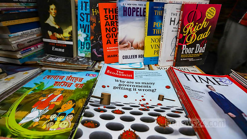 Md Yasin’s magazine stall, 'Jafar Magazine Corner', stands out as one of the last vestiges of a bygone era at Dhaka’s Nilkhet book market. Sales of local and foreign magazines are far lower than it was in the past. Photo: Mahmud Zaman Ovi