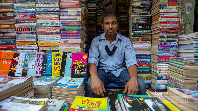 Md Yasin, who started his business by selling magazines at the old books section in Nilkhet’s book market in 1989, says there was once a separate magazine corner. Photo: Mahmud Zaman Ovi