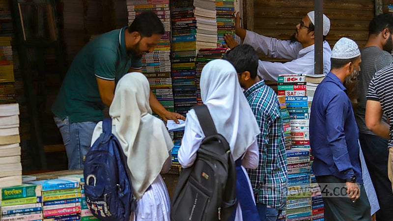 Students are looking for textbooks in the old books section of the Nilkhet book market.  Photo: Mahmud Zaman Ovi
