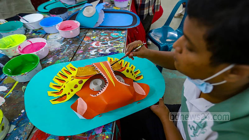 Dhaka University’s fine arts students are crafting masks of different characters for the upcoming Mangal Shobhajatra procession to celebrate the Bangla New Year. Photo: Mahmud Zaman Ovi