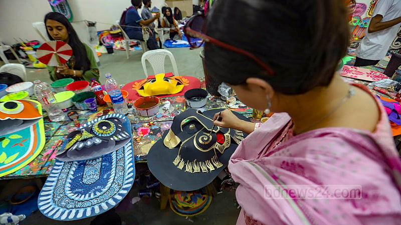 Students of Dhaka University’s Faculty of Fine Arts make things for the Mangal Shobhajatra on Thursday, Apr 13, 2023, as they prepare for the procession to celebrate Bangla New Year. Photo: Mahmud Zaman Ovi