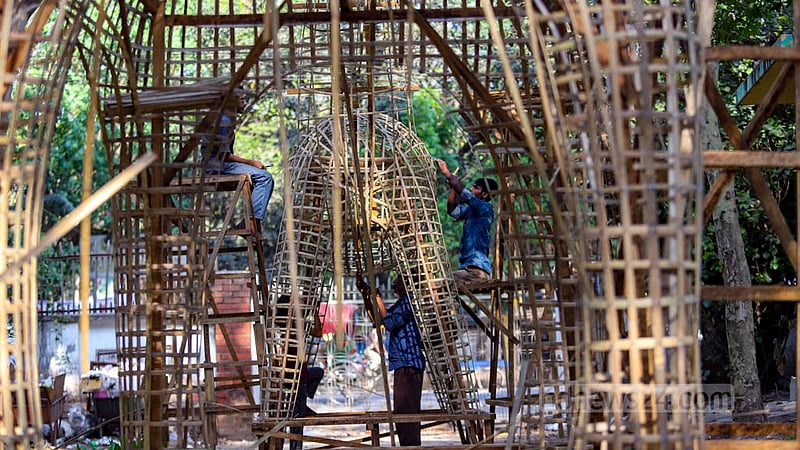 Dhaka University’s Faculty of Fine Arts students create large objects for the Mangal Shobhajatra procession. Photo: Mahmud Zaman Ovi