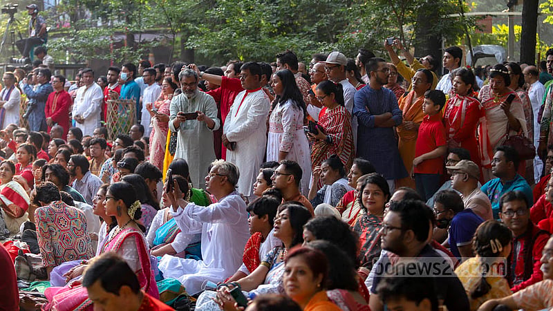 People attend Chhayanaut’s event at Ramna Batamul in Dhaka wearing colourful Baishakhi attires on Friday, Apr 14, 2023. Photo: Mahmud Zaman Ovi