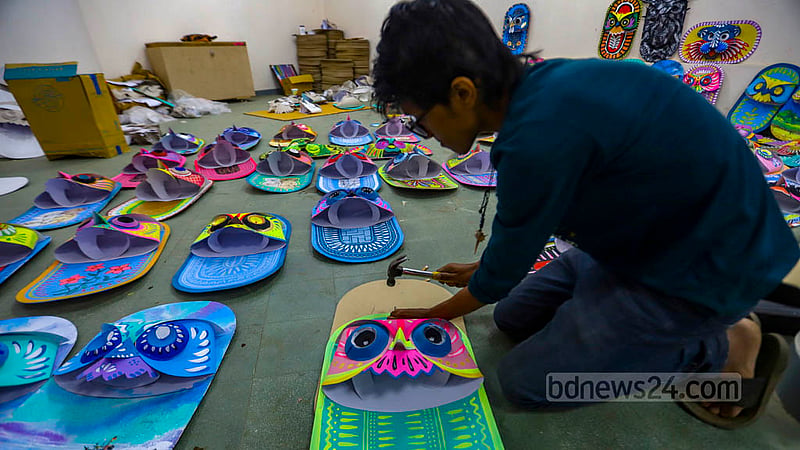 Students of Dhaka University’s Faculty of Fine Arts make masks for the Mangal Shobhajatra procession.  Photo: Mahmud Zaman Ovi