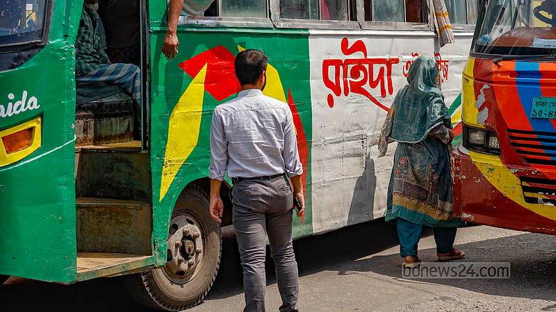 Buses compete with each other in the capital all the time. A bus overtakes another in Badda right before dropping off passengers at a risky spot. Photo: Mahmud Zaman Ovi