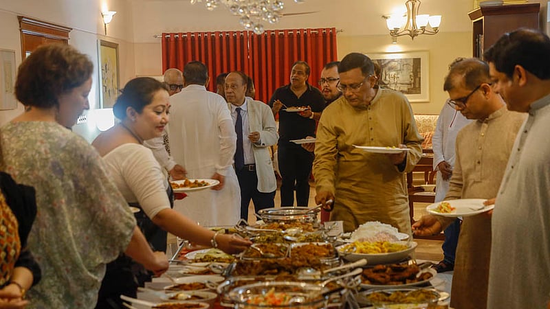 Guests sample a variety of traditional dishes at the Bengali New Year gathering organised by bdnews24.com