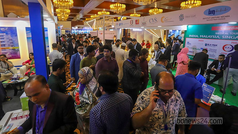 Visitors crowd the 18th Dhaka Travel Mart at Pan Pacific Sonargaon hotel on Thursday, May 18, 2023. Photo: Asif Mahmud Ove