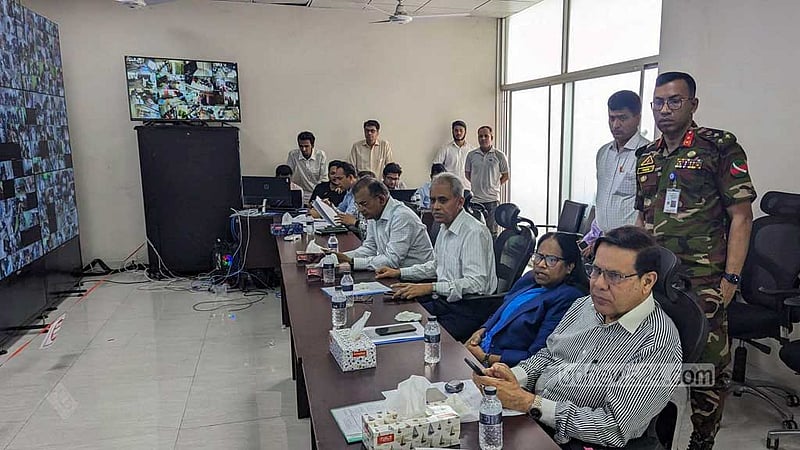 Election commissioners monitor the Gazipur City Corporation election through CCTV cameras at the Election Commission's headquarters in Dhaka's Agargaon.