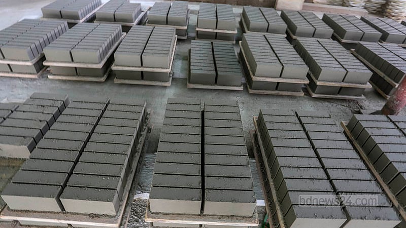 Wet concrete blocks are placed systematically under the sun to dry. Photo: Asif Mahmud Ove