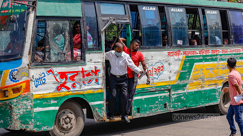 Notun Bazar has a Bus Bay dedicated for bus stoppages, but drivers choose to hit brakes right in the middle of the busy road, forcing passengers to take on risk to board and get off. Photo: Mahmud Zaman Ovi