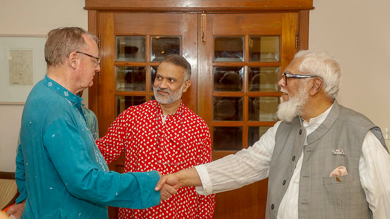 Salman F Rahman, Prime Minister Sheikh Hasina’s adviser on private industry and investment, meets Julian Francis, a Friend of the Liberation War, at the Bengali New Year celebration organised by bdnews24.com.