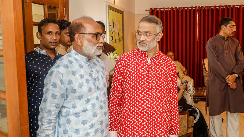 Fisheries and Livestock Minister SM Rezaul Karim meets Toufique Imrose Khalidi, editor-in-chief of bdnews24.com at the Bengali New Year celebration organised by bdnews24.com.