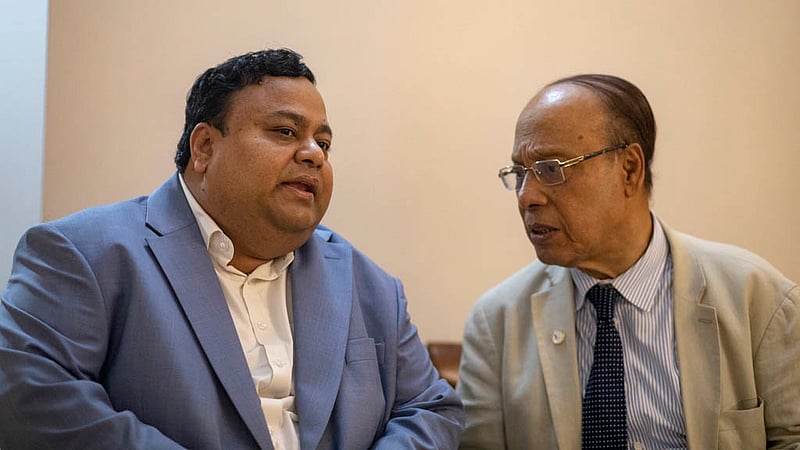 Former vice-chancellor of Dhaka University Professor AK Azad Chowdhury speaks with Chowdhury Nafeez Sarafat, chairman of Race Asset Management PLC, at a Bengali New Year celebration organised by bdnews24.com.