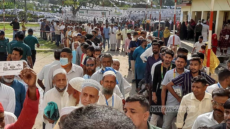 Voters line up in front of the Marialy Government Primary School centre during Gazipur City Corporation election on Thursday, May 25, 2023.