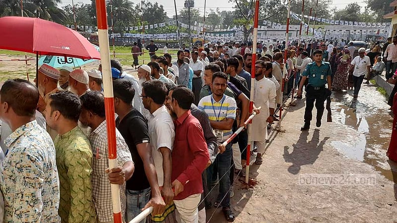 Voters line up in front of the Marialy Government Primary School centre during Gazipur City Corporation election on Thursday, May 25, 2023.