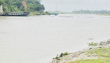 Overflowing river sweeps away woman, her two children in Sunamganj