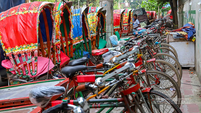Encroachers keep rickshaws and rickshaw-vans even on the footpath in Dhaka’s Tejgaon industrial area, turning the place into a rickshaw garage. Photo: Asif Mahmud Ove