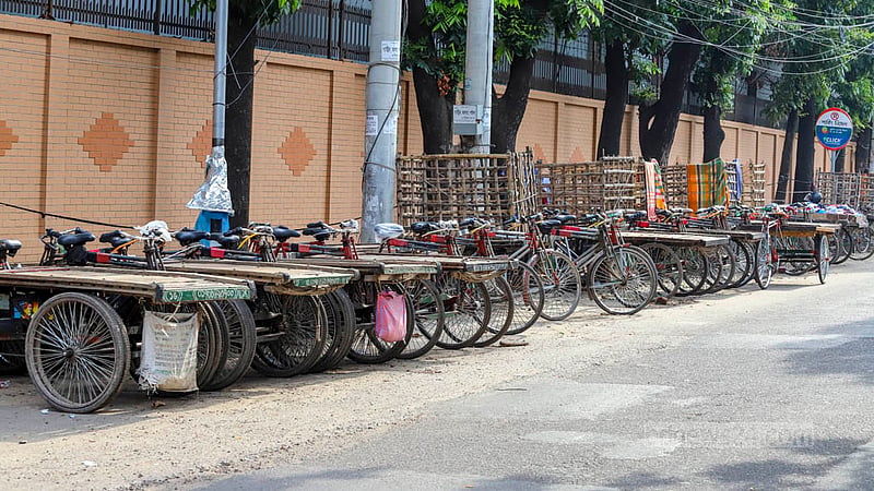 Illegally parked rickshaw-vans occupy parts of the street in Dhaka’s Tejgaon industrial area. Photo: Asif Mahmud Ove